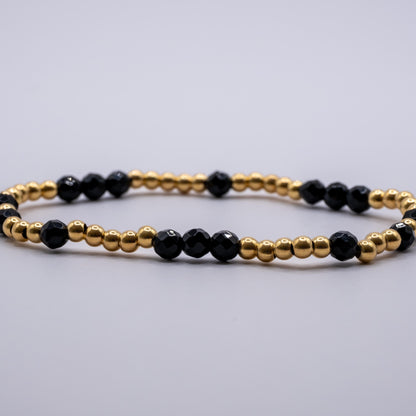 Armband Onyx - facettiert gold