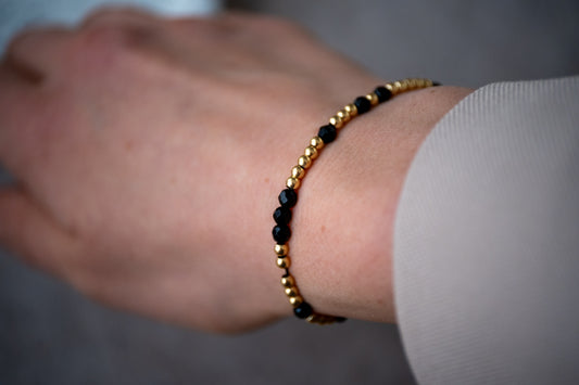 Armband Onyx - facettiert gold